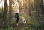 young woman with Miniature Australian Shepherd