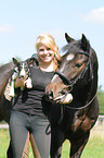 woman with dog and horse