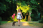 woman and Miniature Bull Terrier