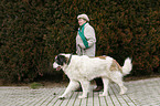older woman with old dog
