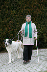 older woman with old dog