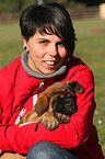 woman with Old English Mastiff Puppy