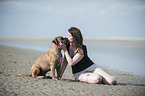 woman and Olde English Bulldog