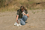 woman with 2 Parson Russell Terrier