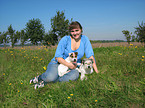 woman with 2 Parson Russell Terrier