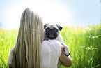 young woman with pug