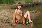 boy with Rhodesian Ridgeback puppy