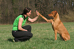 woman with Rhodesian Ridgeback