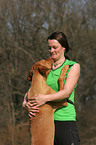 woman with Rhodesian Ridgeback