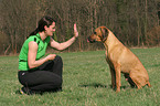 woman with Rhodesian Ridgeback