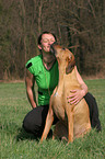 woman with Rhodesian Ridgeback