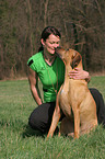 woman with Rhodesian Ridgeback