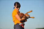 woman and Rhodesian Ridgeback