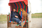 woman and Rhodesian Ridgeback