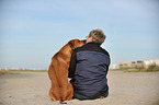 Human and Rhodesian Ridgeback