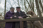 humans with  Rhodesian Ridgeback