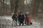 boy with Rhodesian Ridgebacks