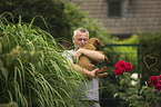 man with Rhodesian Ridgeback