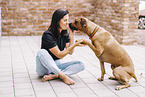 young woman with Rhodesian Ridgeback