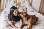 young woman with Rhodesian Ridgeback