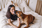 young woman with Rhodesian Ridgeback