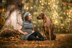 pregnant woman and Rhodesian Ridgeback