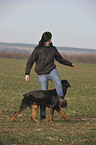 woman and Rottweiler