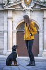 woman with Rottweiler Puppy