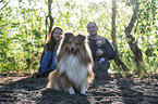 family with Sheltie