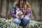 woman with Siberian Husky puppy