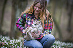 woman with Siberian Husky puppy