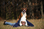 woman with Staffordshire Bullterrier