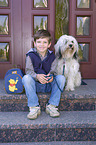boy with Tibetan Terrier