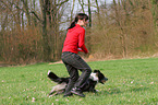 woman plays with Tiger