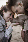 human with Weimaraner