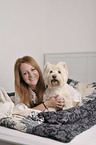 woman with West Highland White Terrier