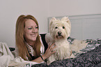 woman with West Highland White Terrier