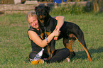 young woman with Rottweiler