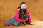 girl with King Charles Spaniel