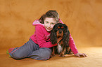 girl with King Charles Spaniel