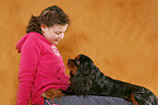 girl with King Charles Spaniel