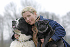 woman with Landseer and pug
