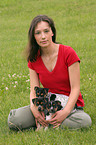 woman with Jack Russell Terrier puppies