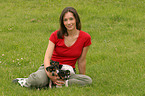 woman with Jack Russell Terrier puppies