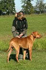 woman with Rhodesian Ridgeback