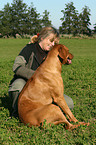 woman with Rhodesian Ridgeback