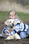 girl with golden retriever