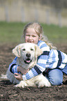 girl with golden retriever