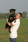 man with Rottweiler