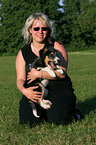 woman with mongrel puppy